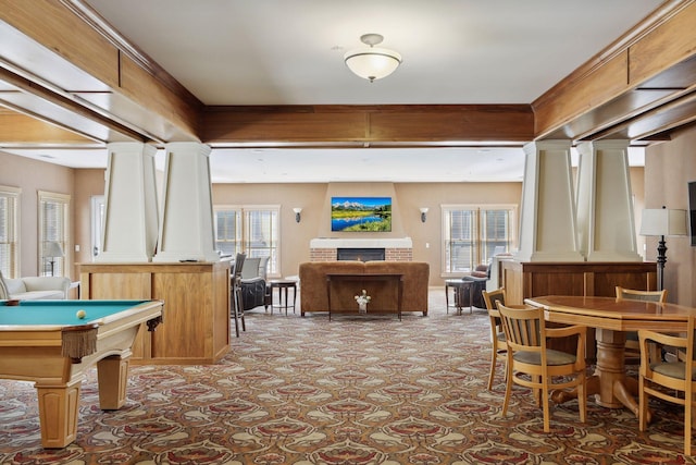 recreation room with a brick fireplace, carpet flooring, billiards, and decorative columns