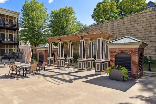 view of patio / terrace featuring a pergola