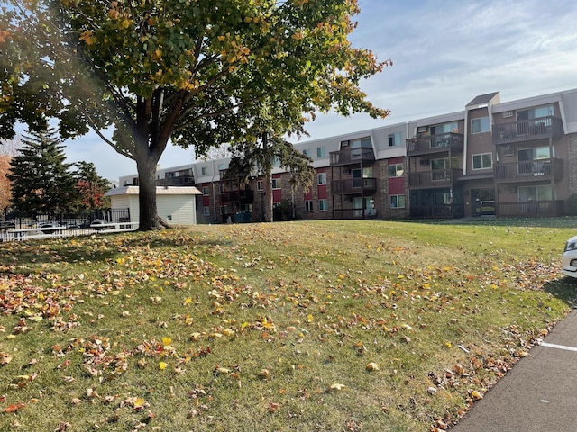 view of community with a yard