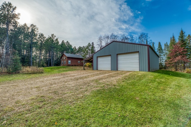 garage with a yard