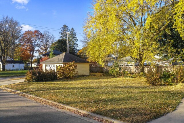 view of side of home featuring a yard