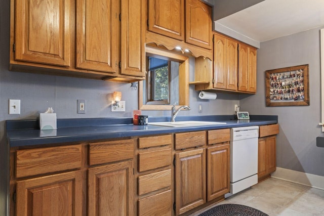 kitchen with dishwasher and sink