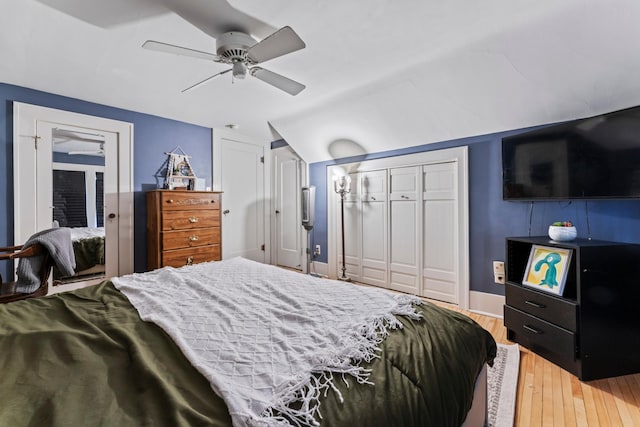 bedroom featuring a closet, wood-type flooring, and ceiling fan