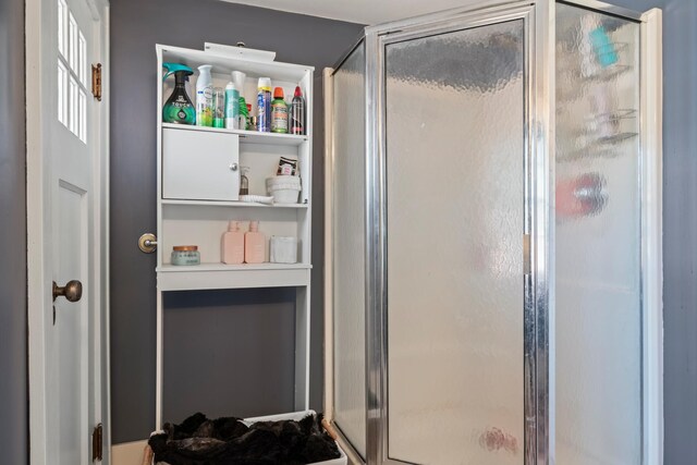 bathroom featuring an enclosed shower