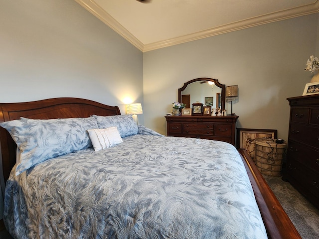 bedroom with crown molding and lofted ceiling