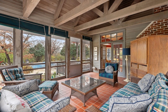 sunroom / solarium with lofted ceiling with beams and wood ceiling