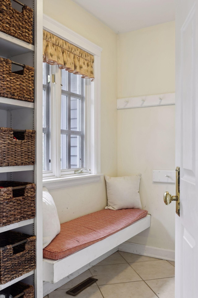 mudroom featuring light tile patterned flooring