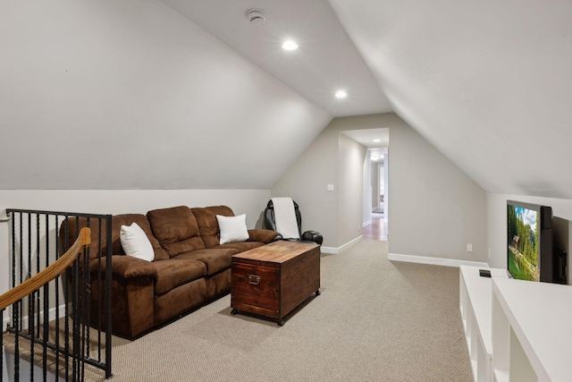 living room with light carpet and vaulted ceiling