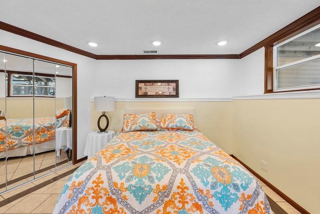 tiled bedroom with crown molding