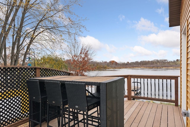 deck featuring a water view