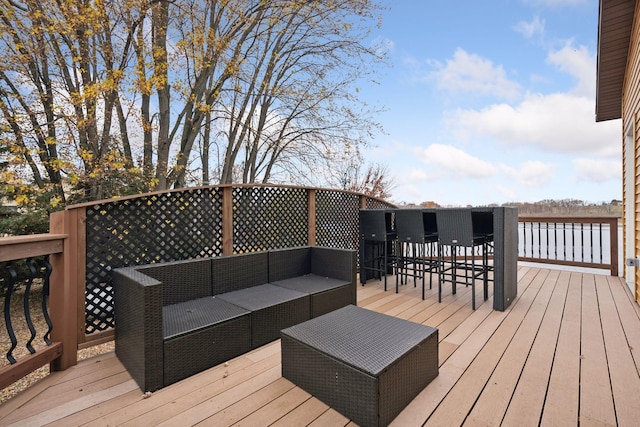 deck with an outdoor hangout area and an outdoor bar