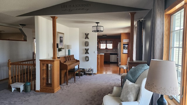 interior space featuring lofted ceiling and a textured ceiling