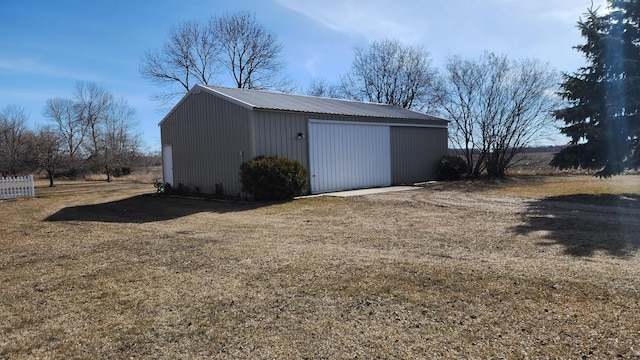 garage with a lawn