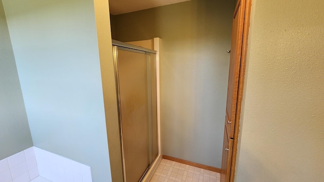 bathroom featuring walk in shower