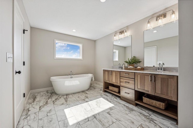 bathroom featuring a bathtub and vanity