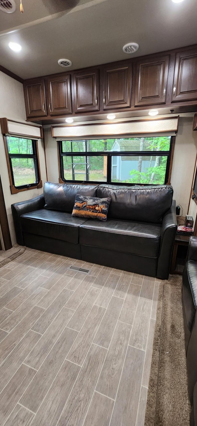 3736 Silent Springs Ct, Webb Lake, WI 54830 - living area with visible vents and light wood-style flooring