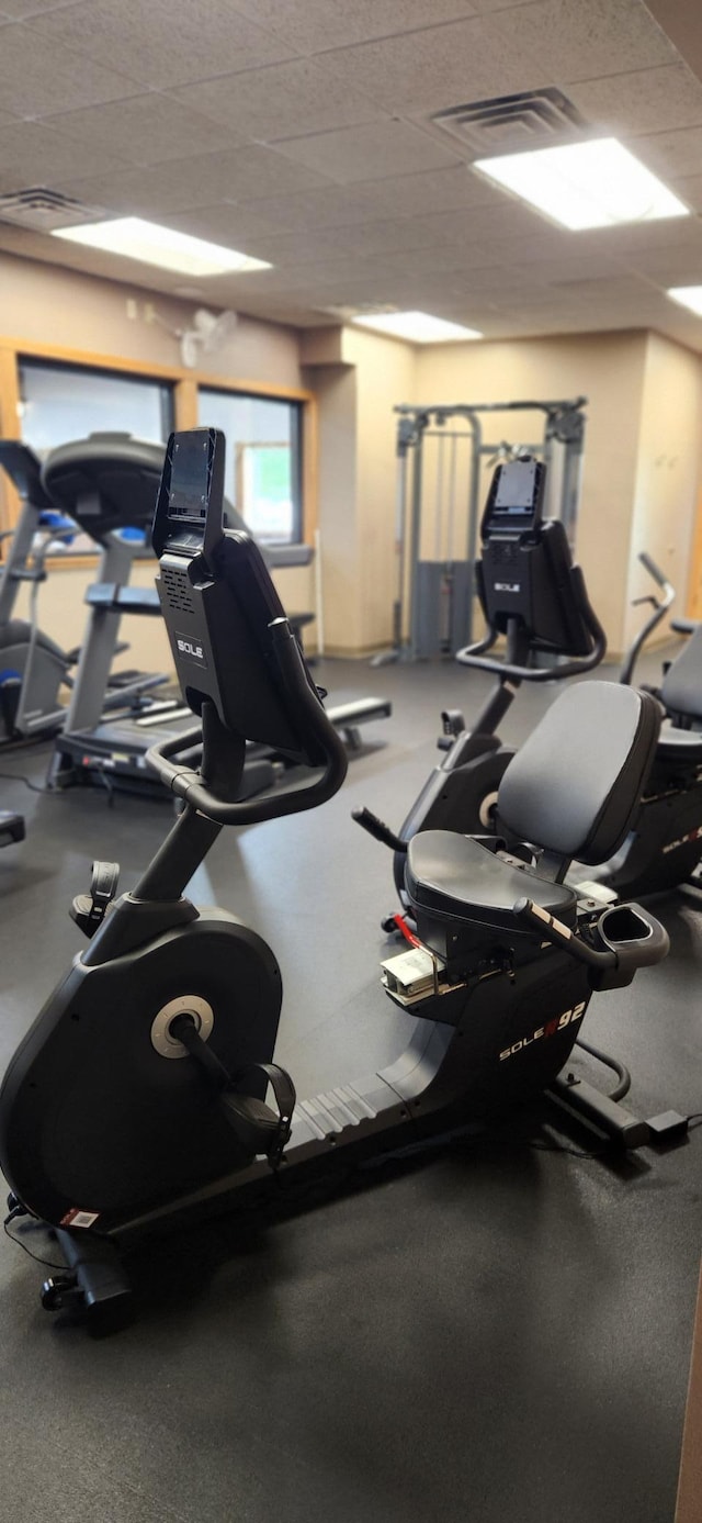 3736 Silent Springs Ct, Webb Lake, WI 54830 - exercise room featuring visible vents and a drop ceiling
