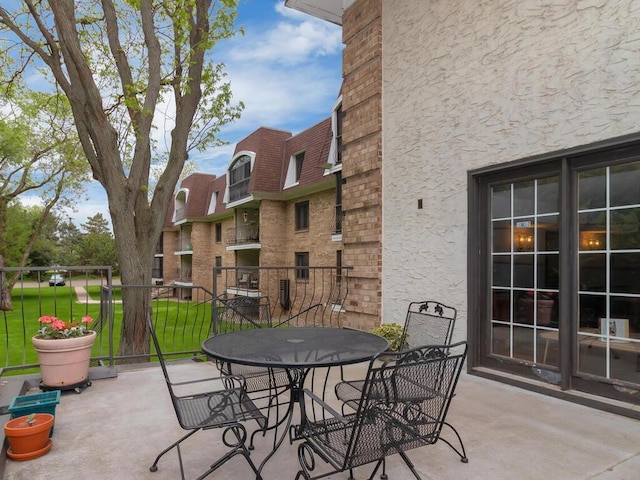 view of patio with a balcony