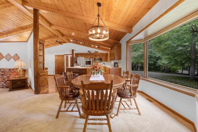 carpeted dining area with a chandelier, lofted ceiling with beams, and wood ceiling