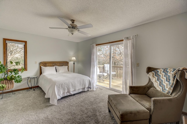 bedroom featuring carpet, ceiling fan, access to outside, and a textured ceiling