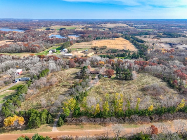 aerial view featuring a water view and a rural view