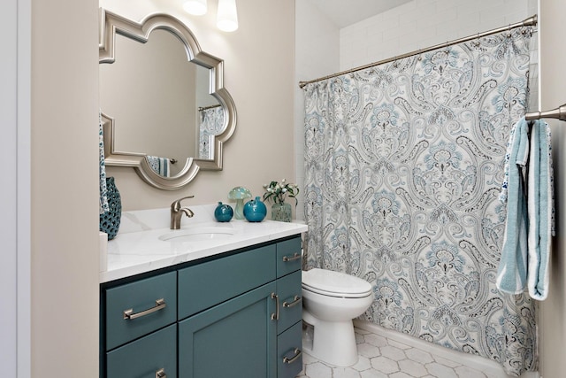 bathroom featuring vanity, toilet, tile patterned floors, and a shower with shower curtain