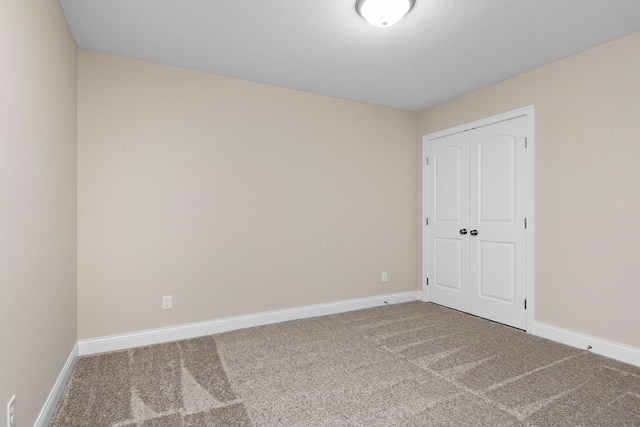 spare room with carpet flooring