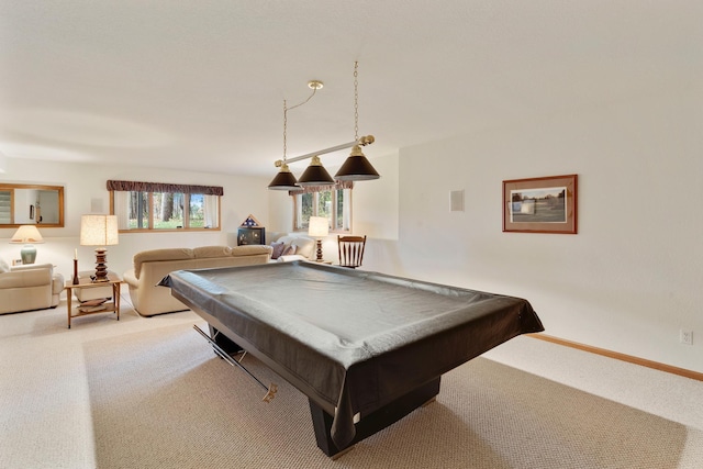 game room with pool table and light carpet