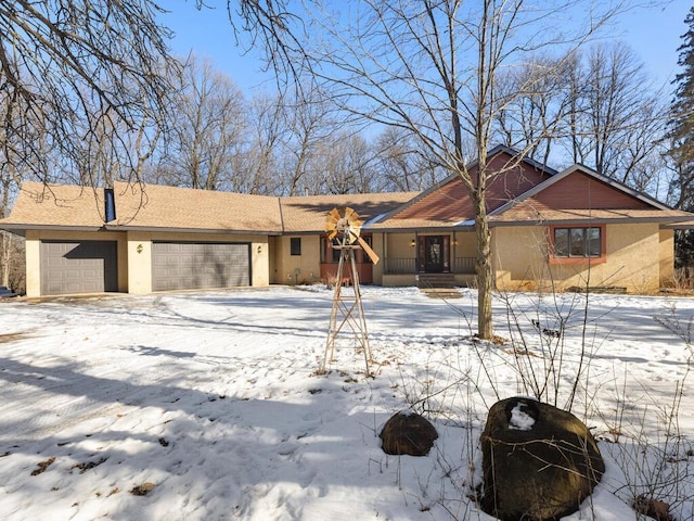 single story home with a garage