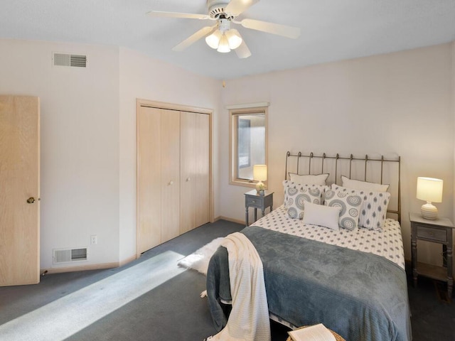 bedroom with carpet, ceiling fan, and a closet