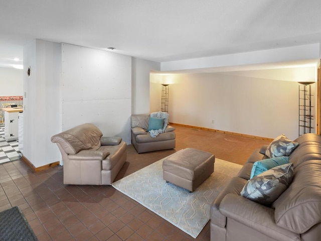 living room featuring dark tile patterned floors