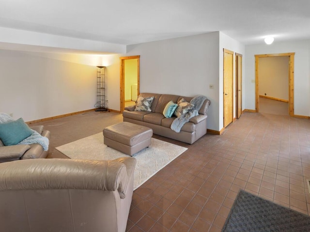 living room with tile patterned floors