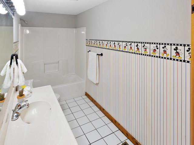 full bathroom with tile patterned flooring, sink, toilet, and washtub / shower combination