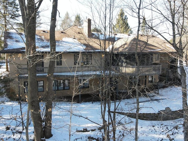 view of snow covered property