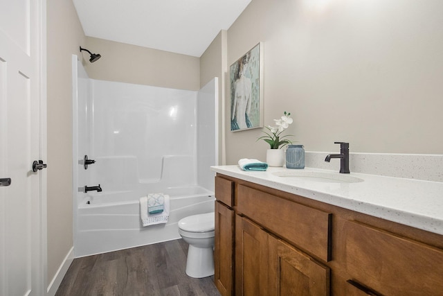 full bathroom featuring toilet, shower / tub combination, vanity, and hardwood / wood-style flooring