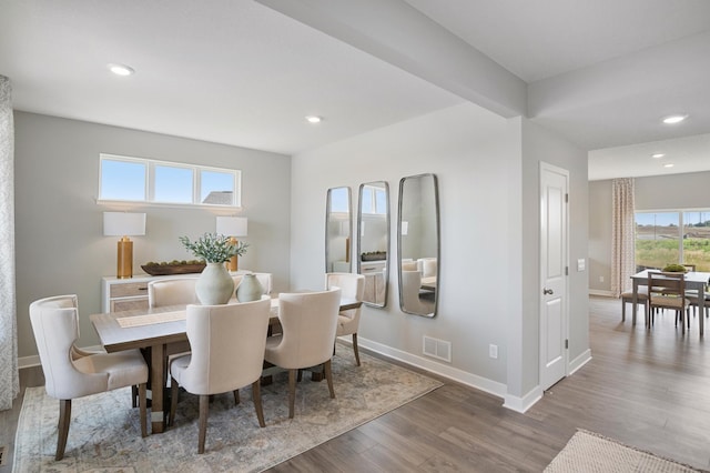 dining space featuring recessed lighting, wood finished floors, visible vents, and baseboards