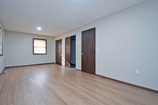 unfurnished bedroom featuring light hardwood / wood-style flooring