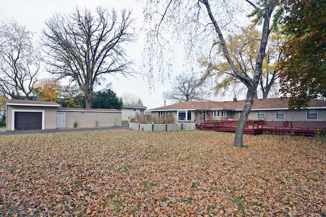 view of yard featuring a wooden deck