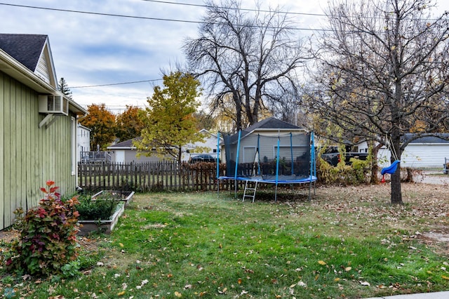 view of yard with a trampoline