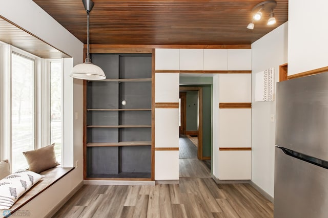 807 4th St S, Moorhead, MN 56560 - interior space featuring wooden ceiling, light wood-style floors, and baseboards