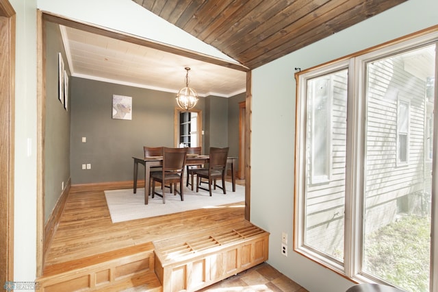 807 4th St S, Moorhead, MN 56560 - dining space featuring a chandelier, lofted ceiling, crown molding, and wood ceiling