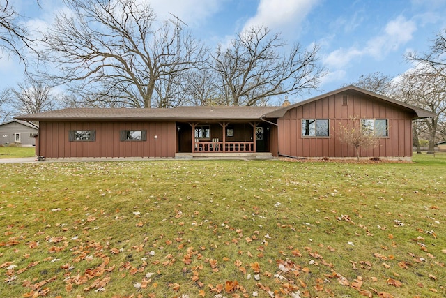 ranch-style home with a front lawn