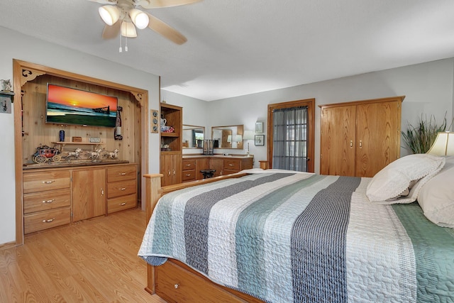 bedroom featuring ceiling fan and light hardwood / wood-style floors