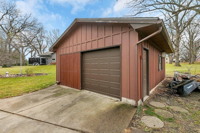 garage with a yard