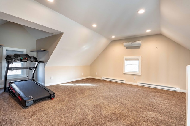 workout area with a wall mounted AC, vaulted ceiling, a wealth of natural light, and a baseboard heating unit