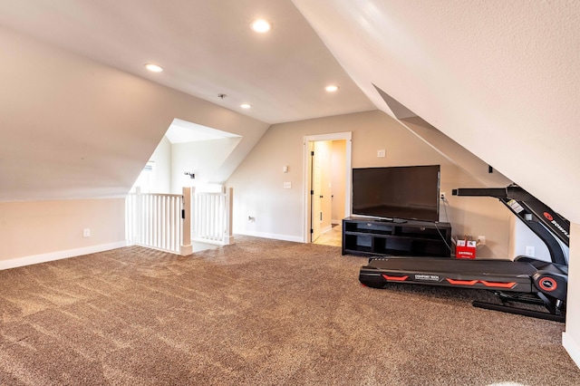 additional living space with lofted ceiling and carpet floors