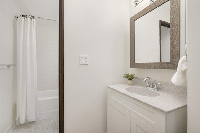 bathroom featuring vanity, tile patterned floors, and shower / bath combo with shower curtain