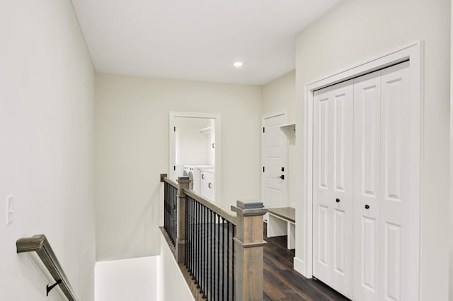 hallway with dark wood-type flooring