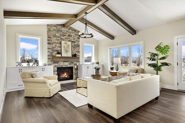 living room featuring dark wood-type flooring, a fireplace, a chandelier, and lofted ceiling with beams