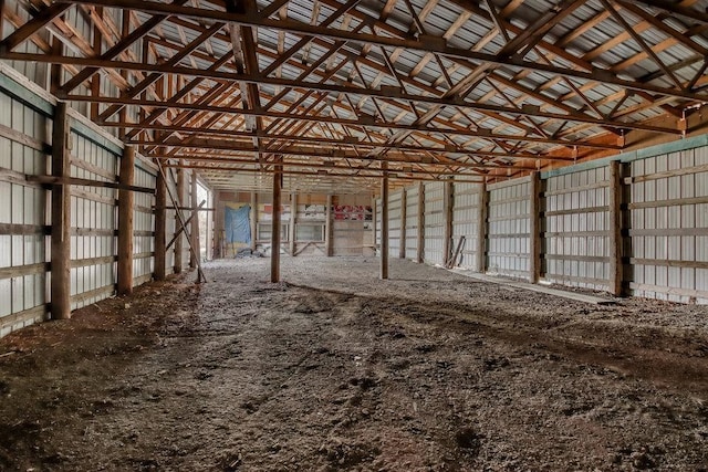 miscellaneous room with lofted ceiling